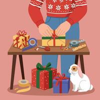 Person Wrapping Gift with Ribbon at Table with Presents and Rabbit vector