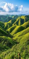 Stunning green hills under blue sky photo