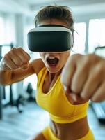 A woman in a yellow sports bra and yellow shorts is wearing a virtual reality headset photo