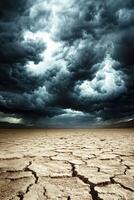 Dramatic clouds loom over parched landscape photo