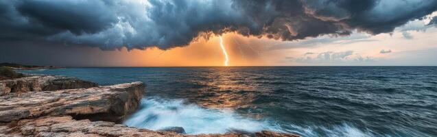 Coastal storm with lightning over the ocean photo
