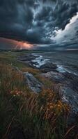 Stormy coast with lightning photo