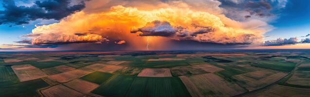 Dusk thunderstorm over vast fields photo