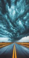 An empty road under a stormy sky photo