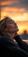 Woman embracing tranquility during perimenopause sunset photo