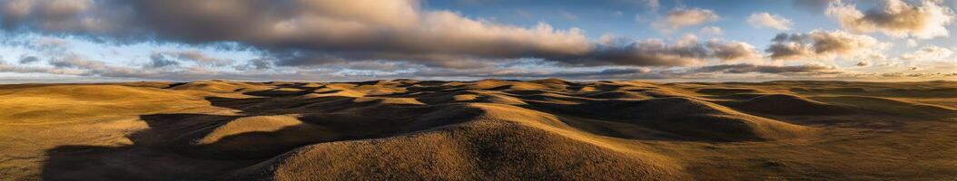 A view of the desert with clouds in the sky photo