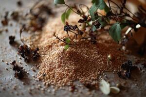Psyllium seeds and dried plants are scattered on a surface photo