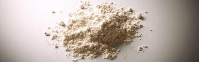 Psyllium powder displayed on a smooth surface photo