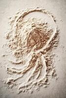 Psyllium powder artfully arranged on a flat surface photo