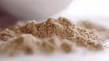 Psyllium powder on a clean surface ready for use photo