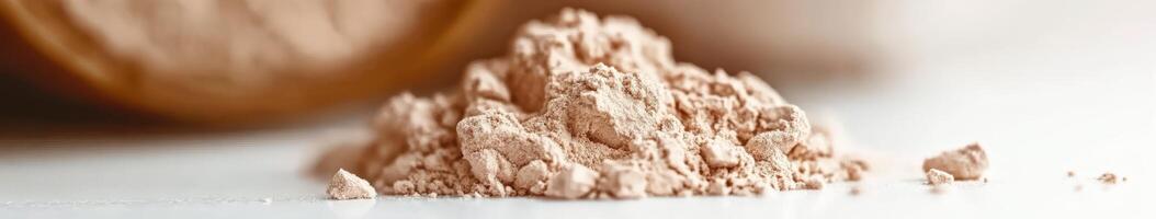 Psyllium powder spread across a clean white surface photo