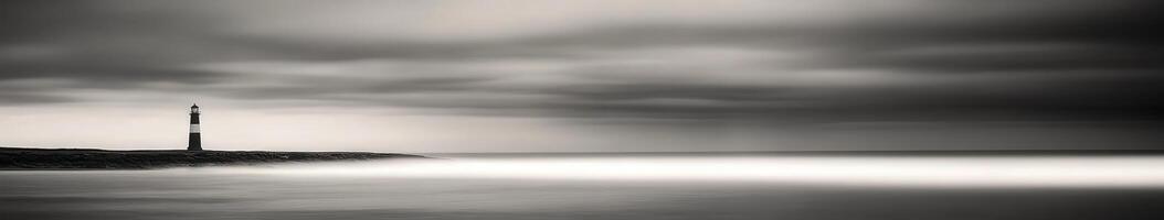 Coastal lighthouse stands against an overcast sky photo