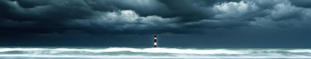 Sturdy lighthouse stands against dark stormy skies photo