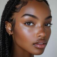 Boho braids with natural makeup in warm lighting photo