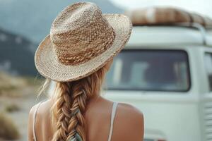 Boho braids and straw hat against a vintage van photo