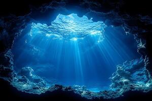 Underwater Cave with Sunlight Rays Creating a Mystical Ocean Scene for Nature and Adventure Themes photo