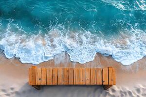 Serene Beachfront Wooden Deck Overlooking Turquoise Ocean Waves - Ideal for Relaxation Themes photo