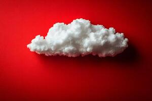 White Fluffy Cloud on Bold Red Background for Creative Design Concepts photo