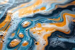 Abstract Fluid Art with Vibrant Swirls of Orange and Blue photo