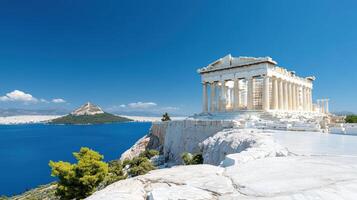 Stunning view of Acropolis with clear blue sky and sea photo