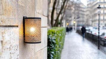 close up of decorative street lamp illuminating Parisian sidewalk photo