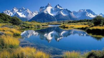 Majestic mountain range reflected in serene lake, showcasing nature beauty photo
