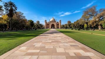 Majestic view of historical Red Fort in Delhi, surrounded by lush greenery photo