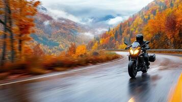motorcycle speeding through vibrant autumn landscape with colorful trees photo