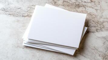 Blank sheets of paper stacked on marble surface, perfect for notes photo