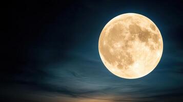 magical night sky with full moon illuminating clouds photo