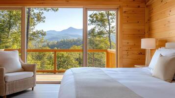 Luxurious cabin bedroom with scenic mountain view and wooden decor photo