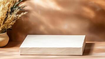Minimalist packaging mockup on warm background with dried flowers photo