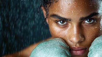 focused fighter face with sweat dripping, showcasing determination and strength photo