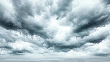 Dramatic stormy sky with dark clouds rolling in, creating moody atmosphere photo