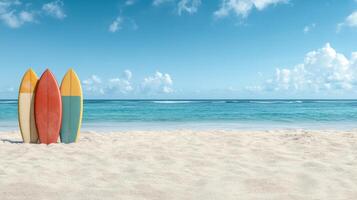 Colorful surfboards on sandy beach with clear blue ocean view photo
