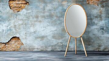 stylish oval mirror stands against textured wall, reflecting its surroundings photo