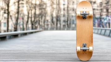 Skateboard resting on wooden surface with blurred urban background photo