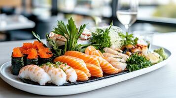 Elegant seafood platter featuring sushi, sashimi, and garnishes photo