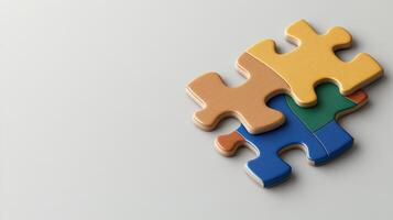 Colorful jigsaw puzzle pieces arranged on light gray background photo