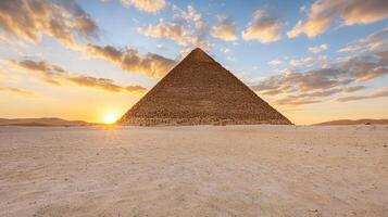 pyramid with vibrant desert sunset backdrop creates stunning scene photo