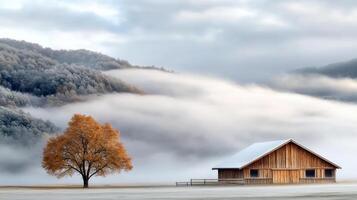 serene wooden barn surrounded by soft morning fog and lone tree photo
