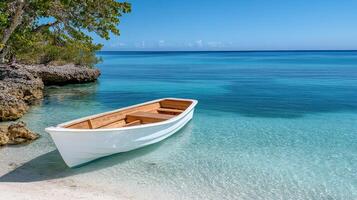 traditional wooden boat anchored in calm bay with clear water photo