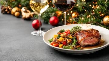 Christmas dinner with roast pork and vegetables photo