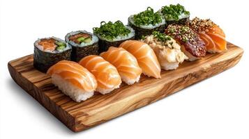 Sushi platter with assorted sushi and rolls on wooden board photo