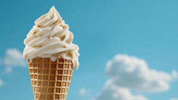 close up of melting ice cream cone against blue sky photo