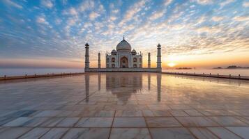 golden sunrise over Taj Mahal with soft mist rising, creating serene atmosphere photo