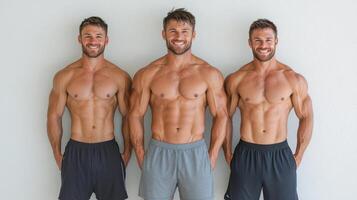 Three muscular men standing side by side, showcasing fitness and strength photo