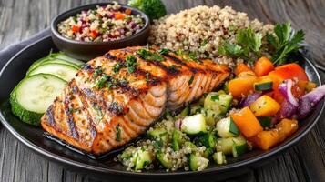 colorful Mediterranean diet meal featuring grilled salmon, quinoa, and fresh vegetables photo