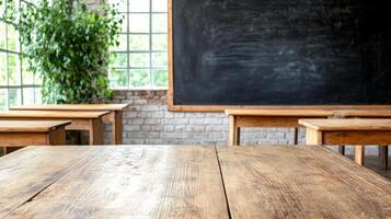 An empty classroom with wooden tables and chairs photo