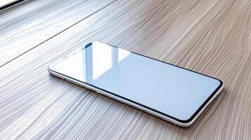 An iphone on a wooden table photo